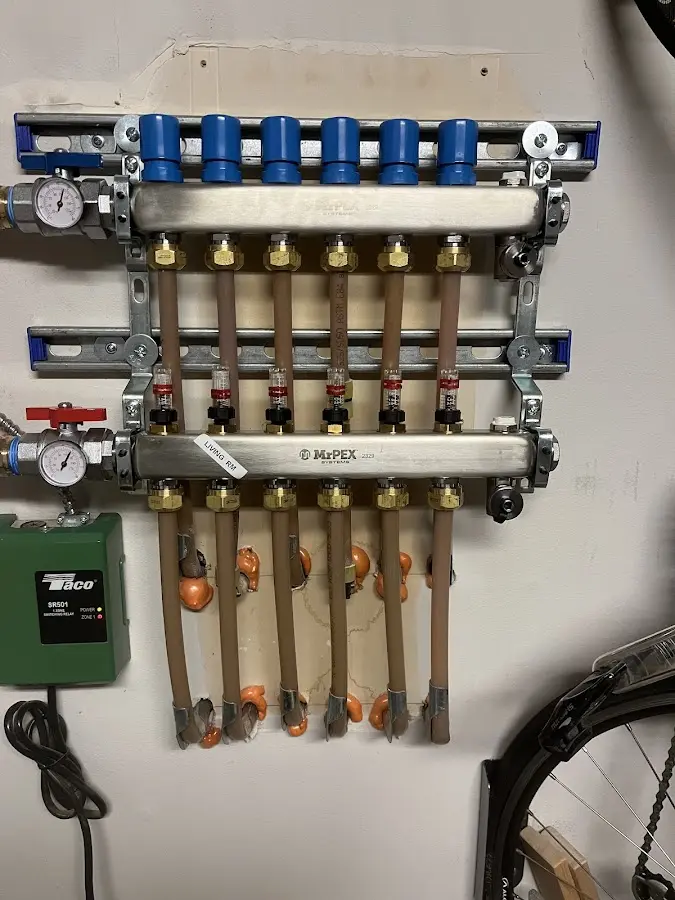 Plumber performing Water Heater Repair at a residential property in Fort Campbell North